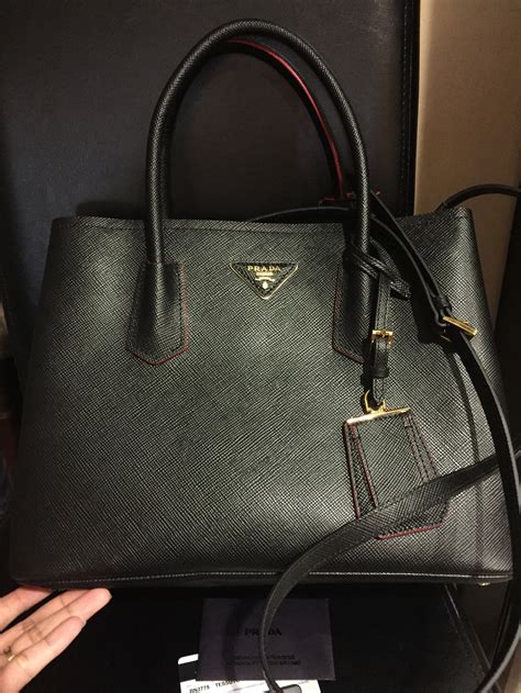 prada sling bag street|authentic pre owned prada handbags.